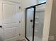 Modern glass enclosed shower with black trim at 1120 Red River Rd, Salisbury, NC 28144