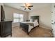 Cozy bedroom featuring a ceiling fan, and large window with lots of light at 1122 Saratoga Blvd, Indian Trail, NC 28079