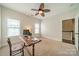 Bedroom with neutral walls and carpet, two windows with blinds, and a ceiling fan at 1122 Saratoga Blvd, Indian Trail, NC 28079