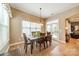 Dining room with table, 6 chairs, and a view to the yard at 1122 Saratoga Blvd, Indian Trail, NC 28079