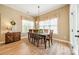 Bright dining room with table, chairs and hardwood floors at 1122 Saratoga Blvd, Indian Trail, NC 28079