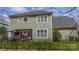 Back exterior view of the home with a fenced yard and covered patio at 1122 Saratoga Blvd, Indian Trail, NC 28079