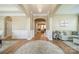 Elegant foyer with hardwood floors, arched entryway, and neutral decor creating a welcoming atmosphere at 1122 Saratoga Blvd, Indian Trail, NC 28079