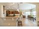 Bright and modern kitchen with granite counters and a view to the dining area at 1122 Saratoga Blvd, Indian Trail, NC 28079
