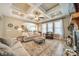 Open living room with coffered ceilings, hardwood floors and plenty of seating at 1122 Saratoga Blvd, Indian Trail, NC 28079