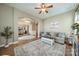 Open living space showcasing hardwood floors and seamless transitions to dining and other living areas at 1122 Saratoga Blvd, Indian Trail, NC 28079