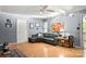 Comfortable living room with gray walls, wood floors, and a cozy sectional sofa at 1210 Brookwood Dr, Shelby, NC 28150