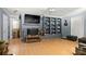 Stylish living room with decorative fireplace, mounted television, and built-in shelves at 1210 Brookwood Dr, Shelby, NC 28150