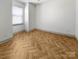 Cozy bedroom features ample natural light and wood floors at 12326 Cranberry Glades Dr, Cornelius, NC 28031