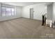 Bright bedroom features a large closet and plenty of natural light at 12326 Cranberry Glades Dr, Cornelius, NC 28031