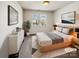 A serene bedroom featuring calming decor, soft natural light, and neutral walls, virtually staged at 12616 Tucker Crossing Ln, Charlotte, NC 28273