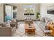 Bright living room with modern furniture and a large window, virtually staged for appeal at 12616 Tucker Crossing Ln, Charlotte, NC 28273