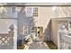 Back of a townhome featuring a patio at 13510 Tranters Creek Ln, Charlotte, NC 28273