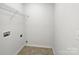 Convenient laundry room with ample space for washer, dryer and storage at 13510 Tranters Creek Ln, Charlotte, NC 28273