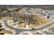 A neighborhood featuring well-kept homes, tree lines, and an orderly street layout at 14030 Turncloak Dr, Charlotte, NC 28278