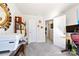 Cozy carpeted bedroom featuring a functional workspace and plenty of storage for maximum organization and comfort at 14030 Turncloak Dr, Charlotte, NC 28278