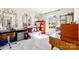 Well-lit bedroom offers ample space for crafts and hobbies with built-in storage and a comfortable work area at 14030 Turncloak Dr, Charlotte, NC 28278