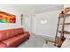 Comfortable living room featuring modern decor, bright accents, and ample seating for relaxation and social gathering at 14030 Turncloak Dr, Charlotte, NC 28278