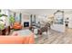 Bright living room featuring a fireplace, plush seating, neutral tones, and attractive decor at 14030 Turncloak Dr, Charlotte, NC 28278