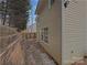 Backyard view featuring vinyl siding, natural landscape and privacy fence at 1411 Swaying Branch Ln, Clover, SC 29710