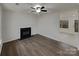 Spacious living room with fireplace and view of the outdoor space at 1411 Swaying Branch Ln, Clover, SC 29710