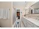 Well-lit bathroom with double sinks, a patterned runner rug, and a shower at 16 Sunrise Point Ct, Lake Wylie, SC 29710