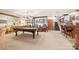 Basement game room features a pool table, a bar area, decorative lighting, and stairs at 16 Sunrise Point Ct, Lake Wylie, SC 29710
