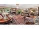 Elegant living room featuring fireplace, chandelier and many luxurious features at 16 Sunrise Point Ct, Lake Wylie, SC 29710