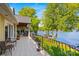 Expansive patio with black metal railing and scenic lake views offering a serene outdoor living space at 16 Sunrise Point Ct, Lake Wylie, SC 29710