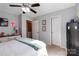 Well-lit bedroom with neutral walls and access to an adjacent bathroom at 1661 California Rd, York, SC 29745