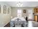 Formal dining room with room to entertain and eat in the bright sunlight at 1661 California Rd, York, SC 29745
