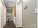 Hallway with storage closet and access to the bedrooms and bathrooms at 1661 California Rd, York, SC 29745