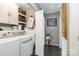 Spacious laundry room featuring built-in shelving and storage solutions at 1661 California Rd, York, SC 29745