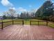 Wooden deck overlooking a well-maintained yard, storage shed and blue sky at 189 Beech Brook Ln, Statesville, NC 28625