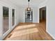 Dining area featuring hardwood floors and access to the deck and kitchen at 189 Beech Brook Ln, Statesville, NC 28625