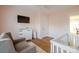 Charming Bedroom with pink walls, sleek furniture and open access to the dining area at 1937 Wilmore Dr, Charlotte, NC 28203