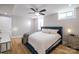 Bedroom featuring a bed with bedside tables, ceiling fan, and wood-style flooring at 1937 Wilmore Dr, Charlotte, NC 28203
