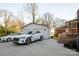 The property features a spacious driveway with two EV charging stations and a detached two car garage at 1937 Wilmore Dr, Charlotte, NC 28203