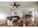 Bright living room features hardwood floors and an open concept connecting to the dining area at 1937 Wilmore Dr, Charlotte, NC 28203