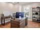 Office space featuring a large desk, second desk, and hardwood floors at 1937 Wilmore Dr, Charlotte, NC 28203