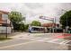 Street view featuring train crossing with train in view and some local businesses in the background at 1937 Wilmore Dr, Charlotte, NC 28203