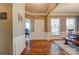 Welcoming foyer with hardwood floors and elegant trim, leading to dining and office spaces at 2056 Angel Oak Dr, Fort Mill, SC 29715