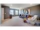 Spacious living room featuring neutral decor, modern artwork, and comfortable seating with natural light at 2056 Angel Oak Dr, Fort Mill, SC 29715