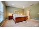 Spacious bedroom with a large window and ample natural light; featuring a king sized bed at 2056 Angel Oak Dr, Fort Mill, SC 29715