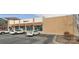 Commercial retail building with parking lot and cars at 2100 Bluebonnet Ln, Matthews, NC 28104