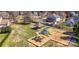 Aerial view of a community playground with slides, swings, and a gazebo at 2100 Bluebonnet Ln, Matthews, NC 28104
