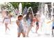 A water feature in a community park offers a fun way for to cool off on a hot day at 2100 Bluebonnet Ln, Matthews, NC 28104