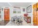 Charming dining area with a table and chairs, window, and unique decor at 2320 Monterey Park Dr, Gastonia, NC 28054
