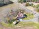 Charming brick home with an attached garage, set on a spacious lot with mature trees and a long driveway at 2615 High Ridge Church Rd, Marshville, NC 28103