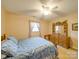 Bedroom with a cozy bed, a ceiling fan and wooden furniture at 2615 High Ridge Church Rd, Marshville, NC 28103